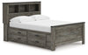 Cama con librería completa y almacenamiento Frandern