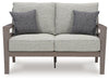Loveseat de exterior Hillside Barn con cojín