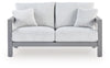 Loveseat de exterior con vista a la luz de la luna y cojín