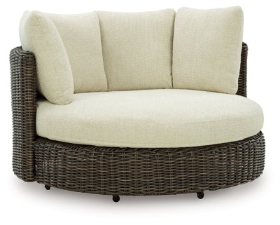 Sillón giratorio de exterior Kimora con cojín