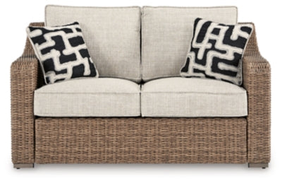 Loveseat de exterior Beachcroft con cojín